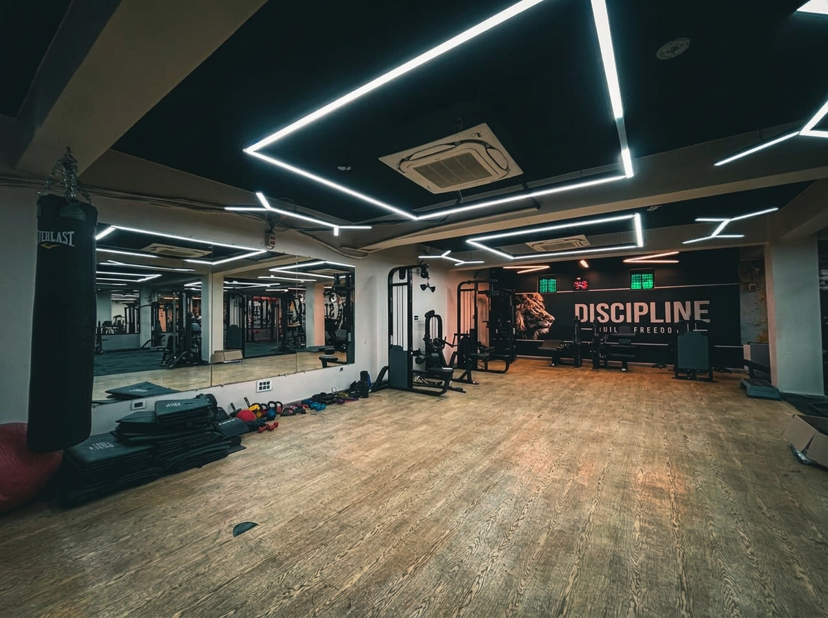 Athlete training with barbell under dramatic lighting
